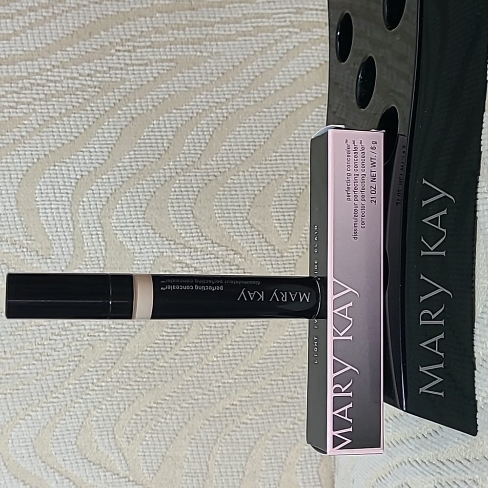 Mary Kay Perfecting Concealer in light ivory.